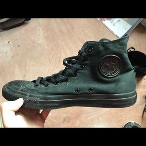 All black original Chuck Taylor high tops
